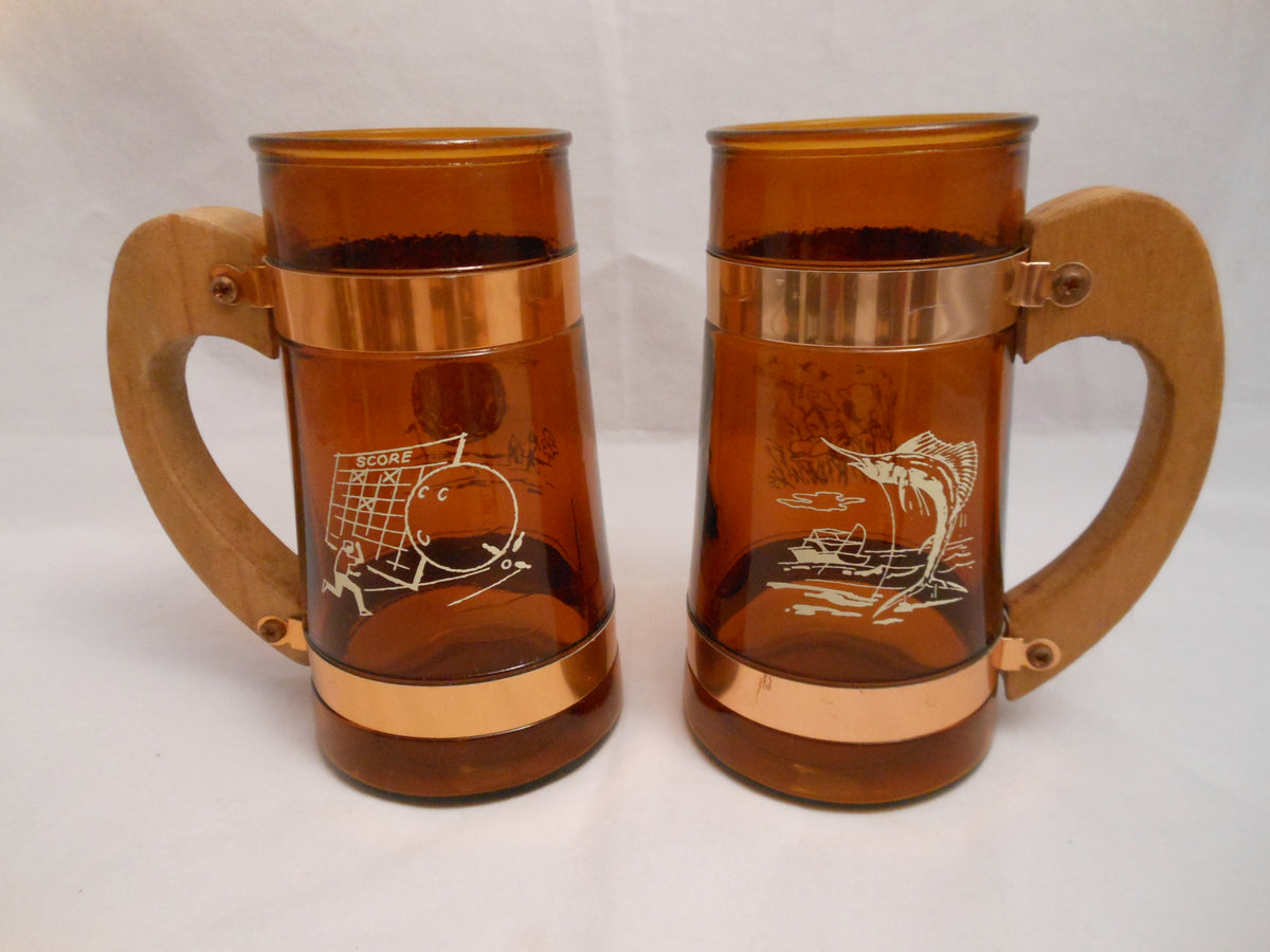 pair of vintage siesta ware Amber brown barrel glass beer mug wood handle